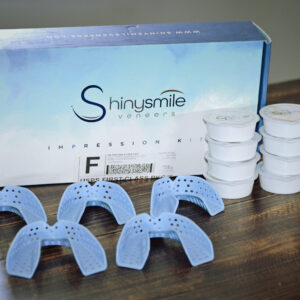 Shiny Smile impression kit box, trays, and putty